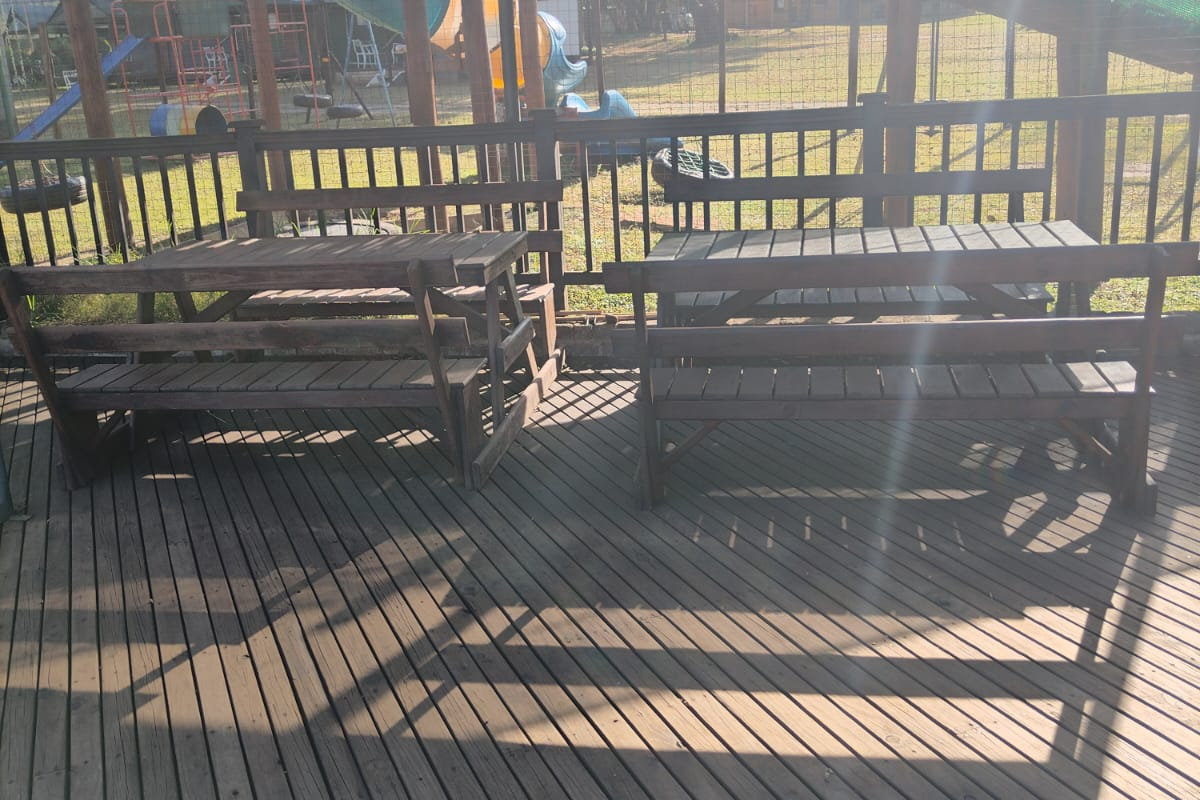 Wooden deck with braai and picnic tables