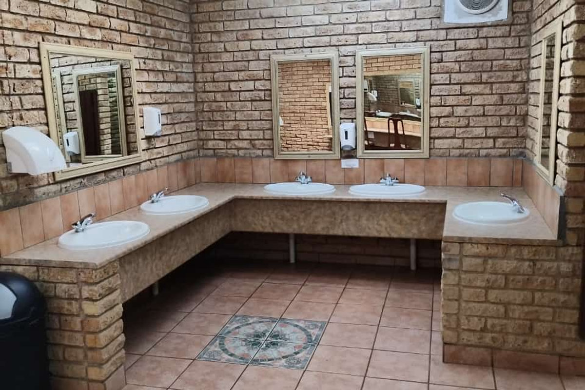Clean modern ablution facilities with basins