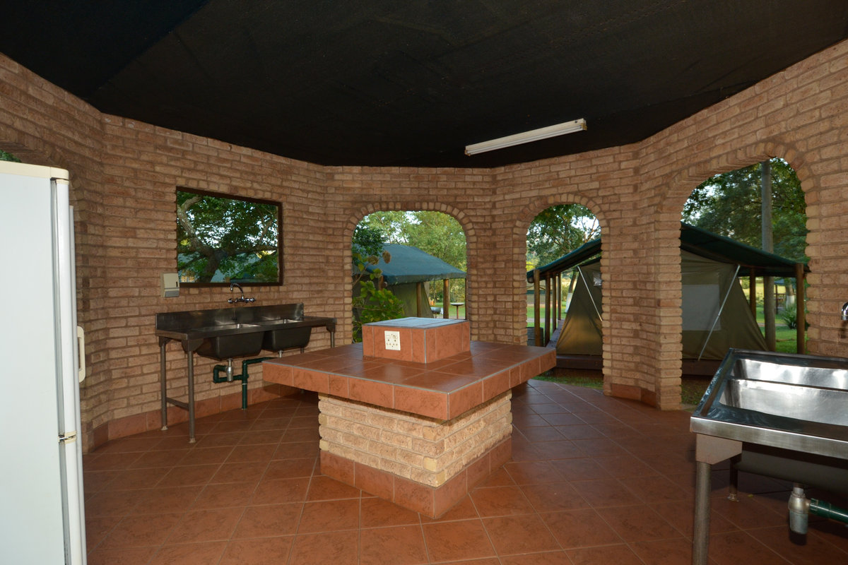 Open communal kitchen with wash-up basins