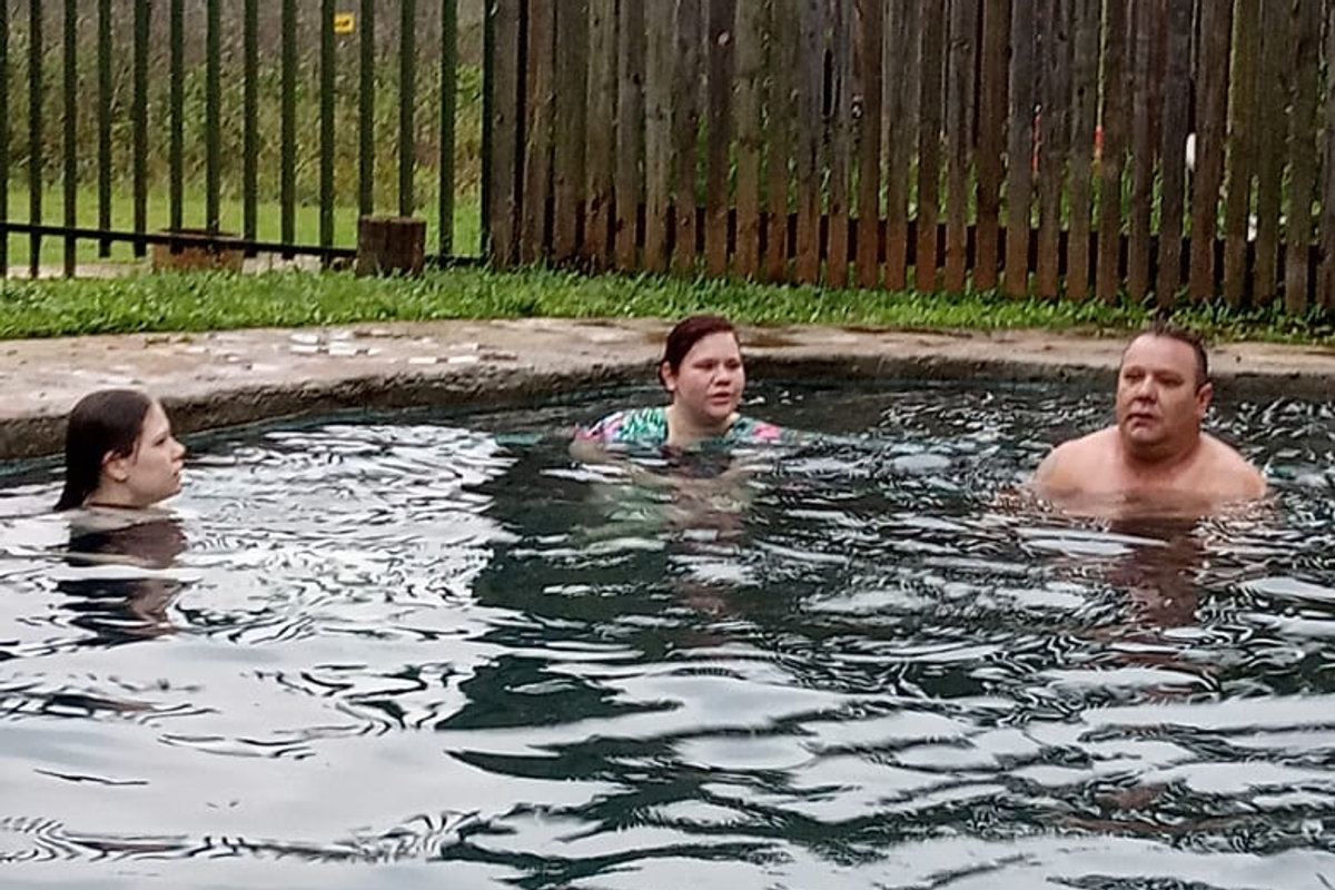 Guests enjoying the heated rock pool